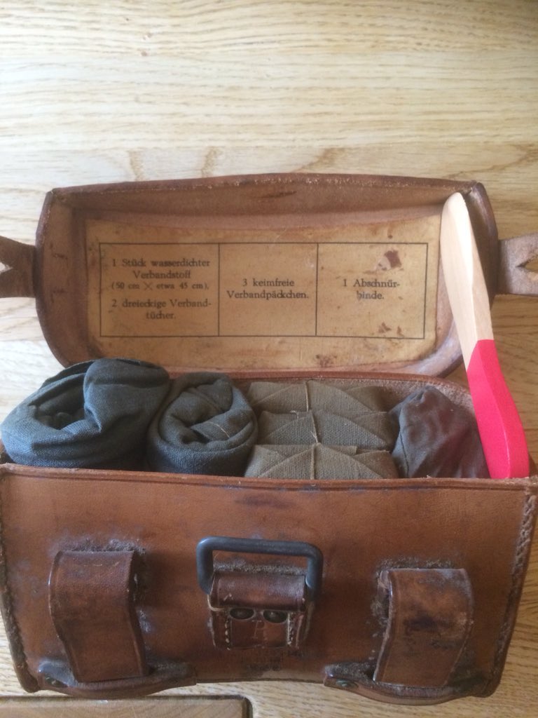 Interior lid labels detailed the items & their packing order. As items were used or added, labels would often be annotated in pencil by their user to update their inventory. Pics are Sani pouches L/R & Krankenträger pouches R/L. 3)