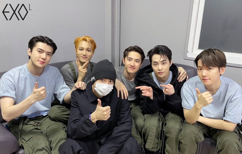Then we got an update that from EXOL-ACE LYSN that we now have Chanyeol's "EXO military send-off tradition photo."We realized they can't post it since members are wearing outfits for their MV and they were waiting to drop it today--- for the 9th anniversary. 