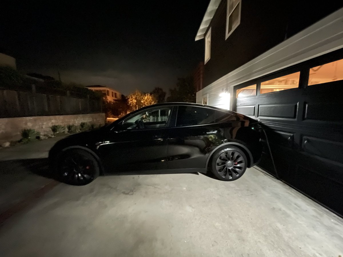 Shon's tweet photo. Just finished a 700 mile round-trip and I’m impressed with this @Tesla Model Y Performance. It’s quick and comfortable. Plus it looks like something out of an old @GreatDismal novel. Has a badass Tactical Soccer Dad vibe.
#militech #cyberpunk #dadtothebone https://t.co/YaKDGqJWKz