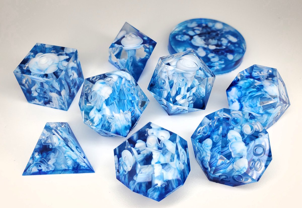 HELP! I have no idea what to name this set! There are a few directions I could go, but I am indecisive and am open to suggestions. 😊 

WIP. Unsanded and uninked.

#dice #diceporn #dnd #resinart #handmadedice #criticalrole #ttrpg