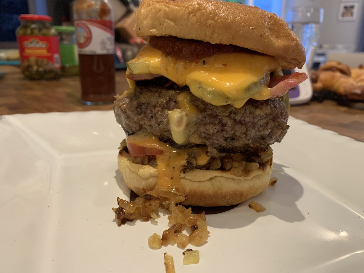 pluincee's tweet photo. A @durruscheese juicy Lucy (short rib from @EmmaNolan2012 minced at home), @GibneyPreserves ghost Chili ketchup, some leftover @Grainne43 Bujo sauce to boot. onions, pickles, bacon, jalapeños, tomatoes, some melty plasticky cheese also. The ‘cut open’ pic was much less pretty! https://t.co/7ET8kbiod7