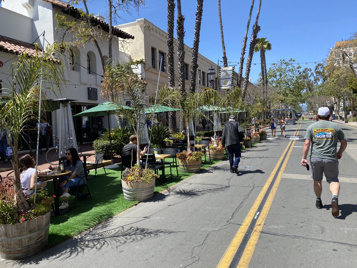 reutimann's tweet photo. Second impression. Not having to design #parklets and outdoor dining to withstand a collision with a large SUV allows for a lot more creativity in design. 🪴🎍🌳🌻There’s only so much you can do with concrete K-rail. #SantaBarbara #StateSt https://t.co/CashR0tbfU
