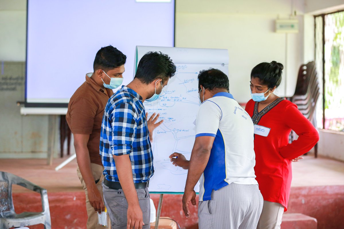 Participatory community mapping is just one of the #communityengagement methods used by our team members during community meetings. Here, members in the #SriLanka team encourage participants to draw their village. #globalhealth #anthropology #participatorymethods #ruralhealth