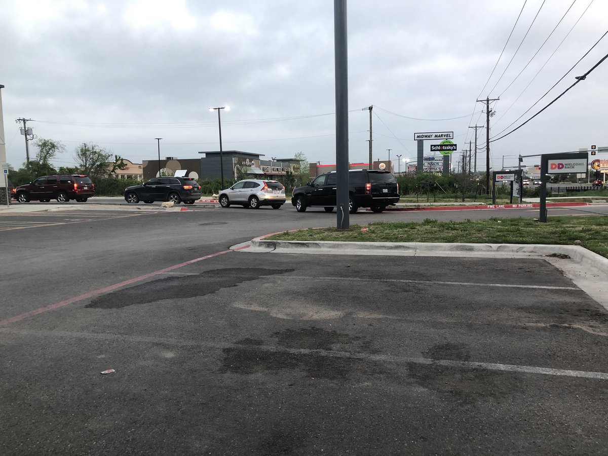 Mrs_Warwick_'s tweet photo. I’m truly regretting ordering on the @dunkindonuts app this morning. My meal is paid for already, but I don’t have the time for this line and the store front is closed. 🙄 https://t.co/AsWC9B2BkL