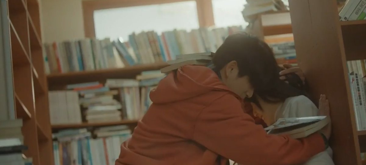 Jaehyun saving Jisoo from the falling pile of books in the library <333