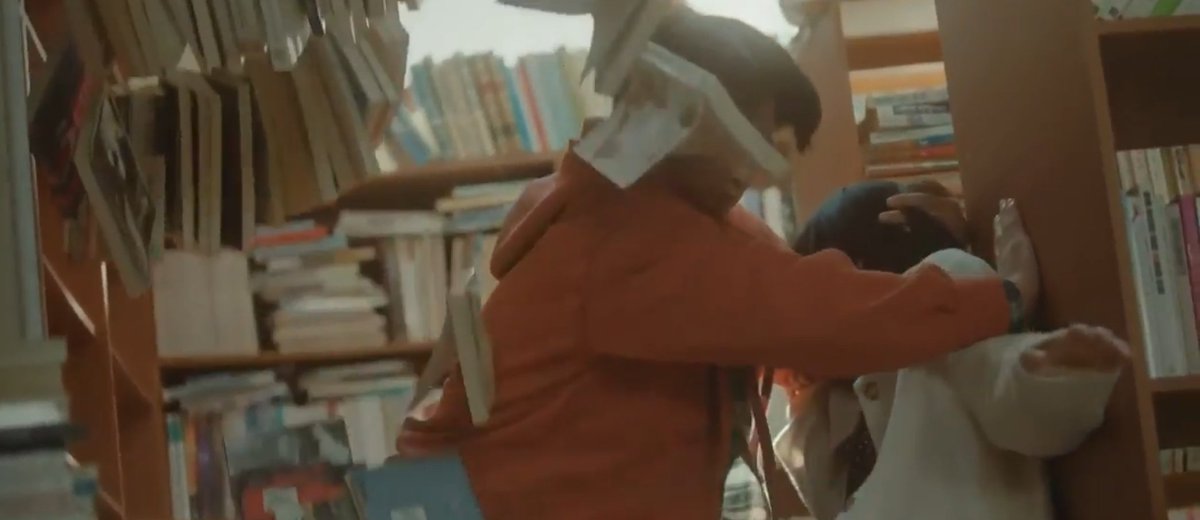 Jaehyun saving Jisoo from the falling pile of books in the library <333