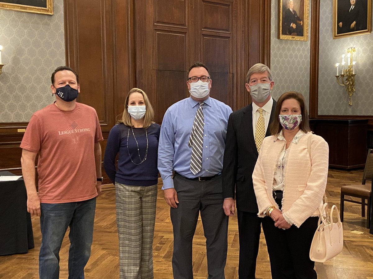 Proud to offer employees access to the COVID-19 vaccine. The health and safety of our employees is our priority as we continue to safely welcome our members at the League. Dr. Mark Lawson and Dr. Mirza Perez are with members Chris Topolewski, President Craig Mills and Liz Mills.