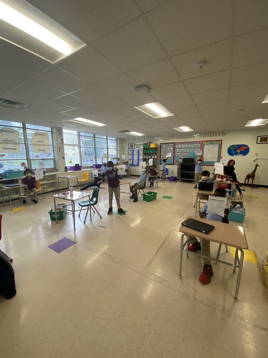 These first graders are BEAMING after reading the compliments from their classmates! <a href="/PosProject/">The Positivity Project</a>