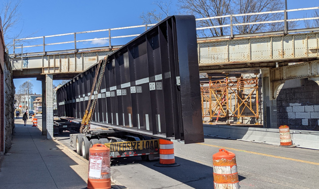 universalhub's tweet photo. A beam in thine own street #roslindale #needhamline #mbta #bridgereplacement https://t.co/76tzf4lkmO https://t.co/xmeeQQtl46