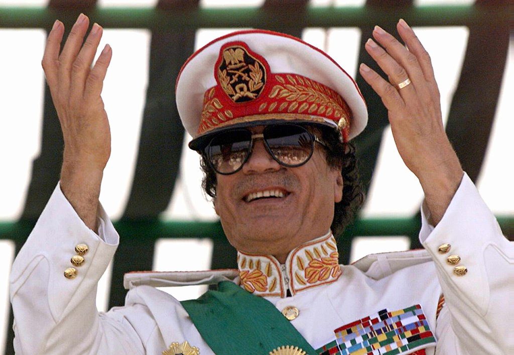 Gaddafi Wasn't Killed Because He Treated His People Bad. Why Would America Care If A President Is A Dictator. Mugabe Would've Died Sooner If That Was The Case. Gaddafi Was Killed Because He Was In The Process Of Uniting Africa Through One Bank & One Currency and One military.