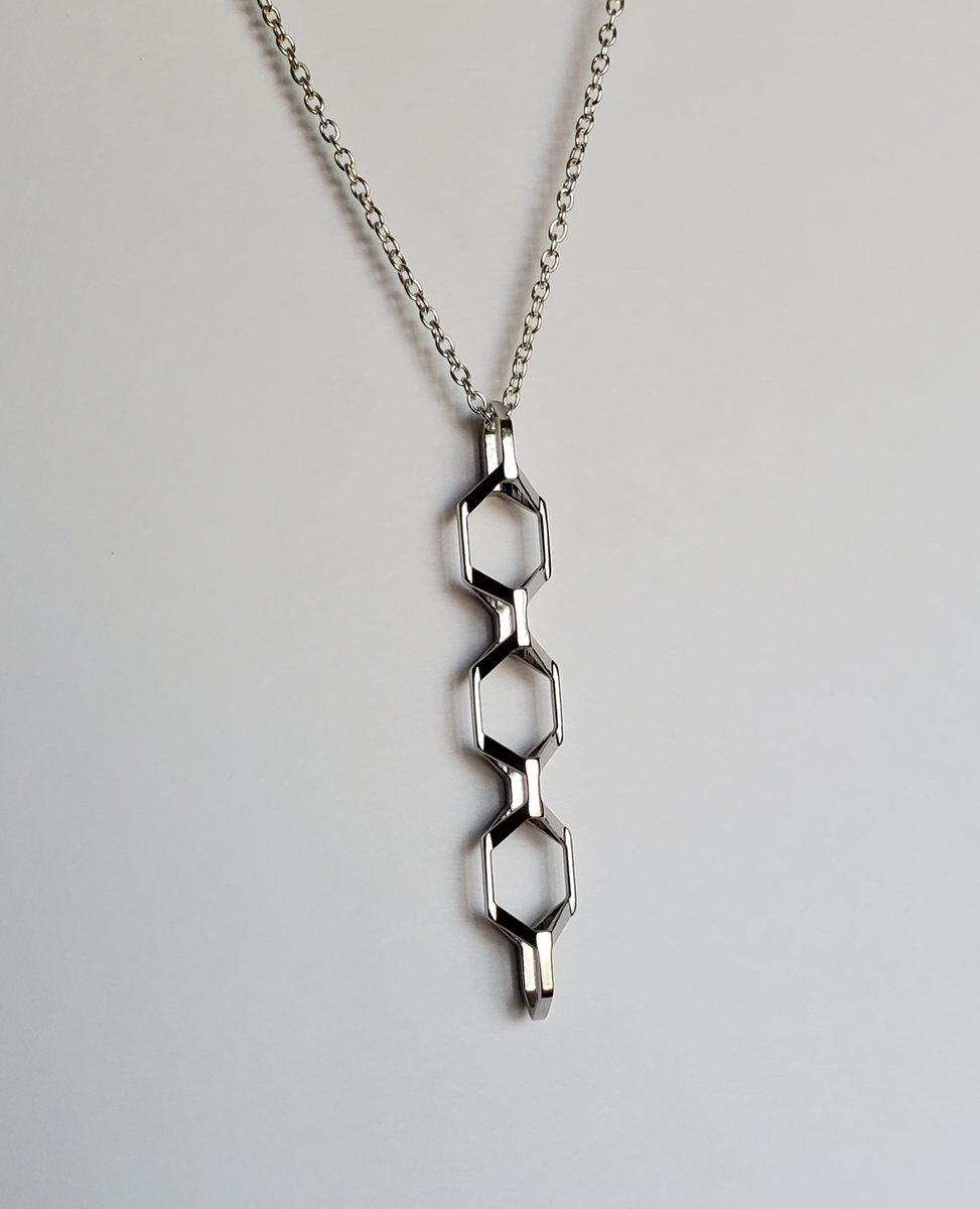 polyfaction's tweet image. An order of the Nexus Pendant shipped this week, and looks quite striking up close. The detail of the piece is fantastic, finished in Rhodium plated brass, created from a 3D printed wax.  Paired to a silver plated chain for matching color.  ⁠
.⁠
polyfaction.com