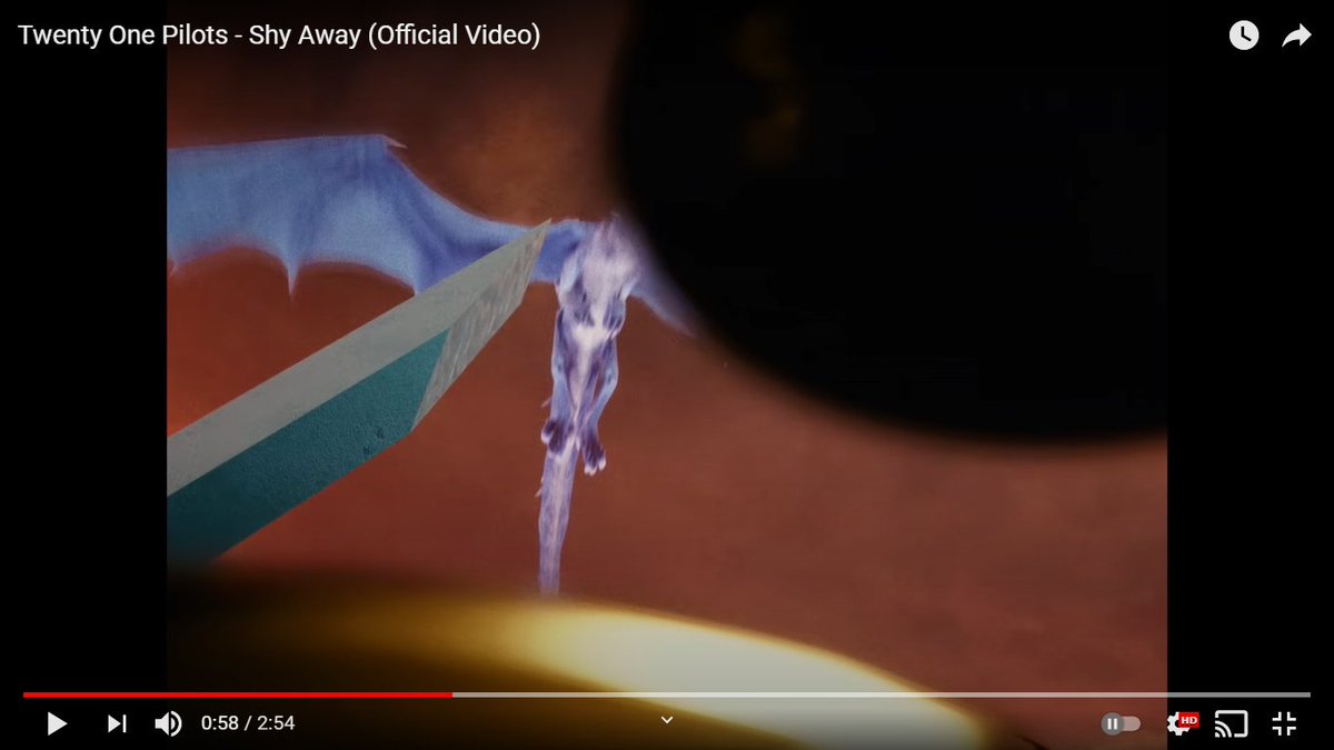 in the music video, the shots showing the dragon, from tyler’s and josh’s perspective, are inverted, (credit  @poptivist ) and when flipped the “right way” (on the right) you can clearly see the blue sky, the white-bright sun, and the dragon which seems… yellow-ish green?