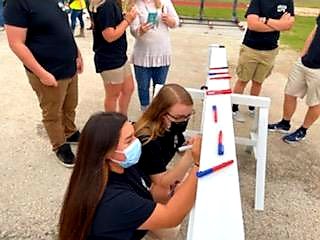BoswellBandGold's tweet photo. Our @BOSDrumMajors & Captains were invited to sign the final I-beam to be lifted into @BoswellHS's brand new stadium press box today! Becoming part of our school's history as we look to our future! #OneBosOneTeam #BosFamily #PioneerPride https://t.co/4LjJNYKSnv
