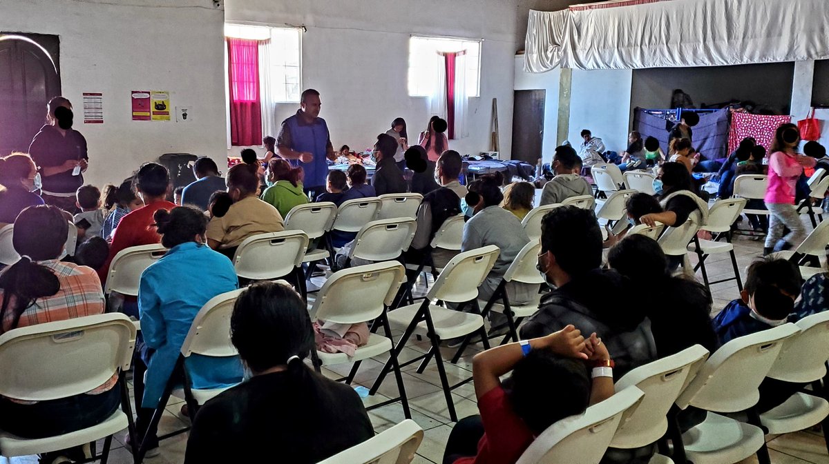 Yesterday while I was visiting a Tijuana shelter for  @humanrights1st INM vans delivered 30+ tired, disoriented asylum seekers (families w kids) directly from the border after the US gov had expelled them from TX under Title 42. They joined 750+ already living in the church. 1/n