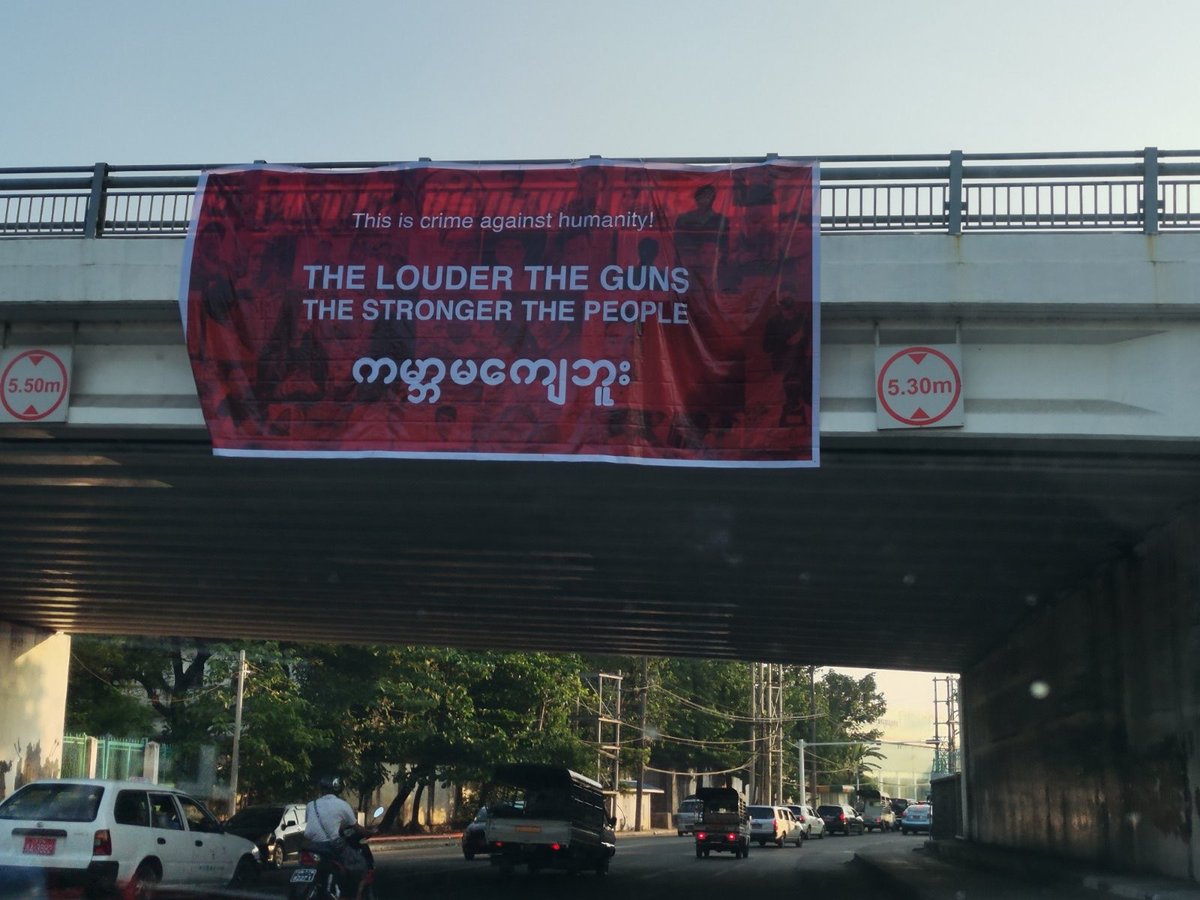 Myanmar_Now_Eng's tweet photo. Posters with anti-coup slogans are found in some places in Yangon on Saturday morning. #WhatsHappeningInMyanmar https://t.co/XGKooSqPF0
