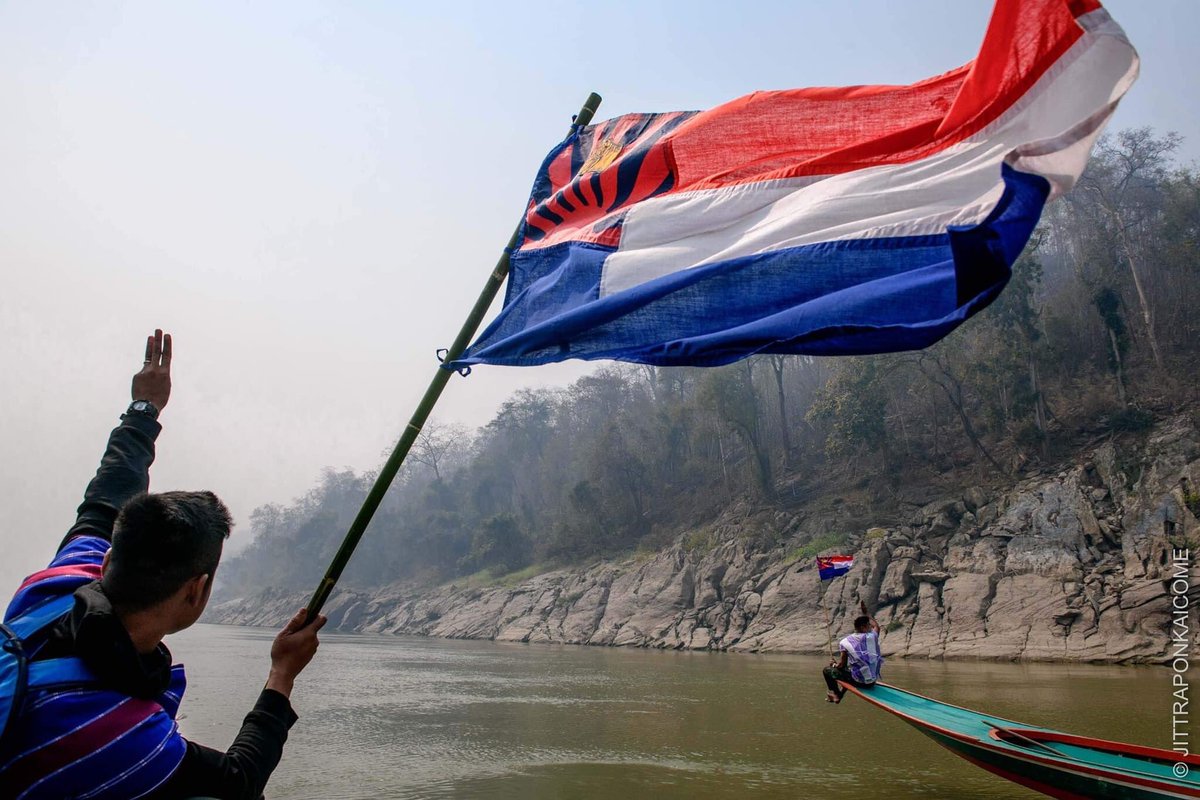 Poppy McPherson (@poppymcp) on Twitter photo The Karen flag flies over the Salween River with a three-finger salute, the symbol of #Myanmar’s anti-coup protest movement. Powerful image by <a href="/JKaicome/">Jittrapon Kaicome</a>.
#WhatsHappeningInMyanmar The Karen flag flies over the Salween River with a three-finger salute, the symbol of #Myanmar’s anti-coup protest movement. Powerful image by <a href="/JKaicome/">Jittrapon Kaicome</a>.
#WhatsHappeningInMyanmar