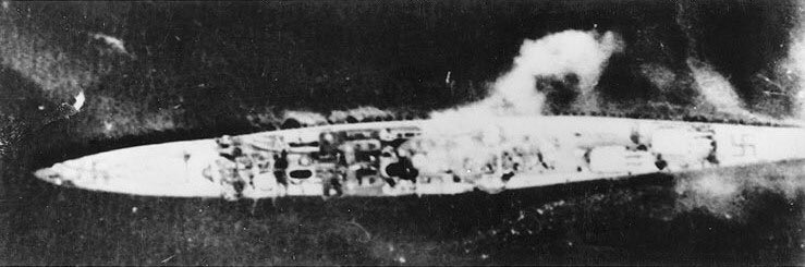 Aboard Königsberg fire started and smoke enveloped the aft of the ship whilst Lt Frasier-Harris hit the Forecastle, Captain McIver struck between her funnels penetrating to her engine room & blowing a hole in the hull