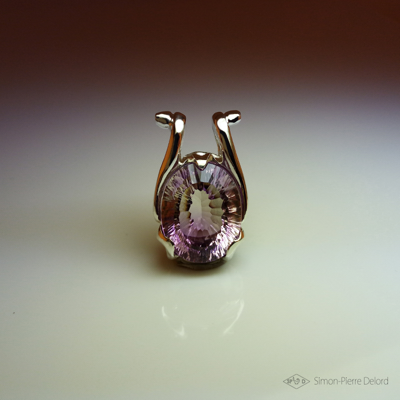Simon_Delord's tweet photo. Jewelery creation entitled "Celestial Beetle". An Amethyst of 23 Carats is encased in a chiseled organic mount made of Argentium. The Universe of this creation is fantasy exobiology. This piece is unique. Made in Cordes-sur-Ciel, Tarn in France https://t.co/ivedqFMi0X