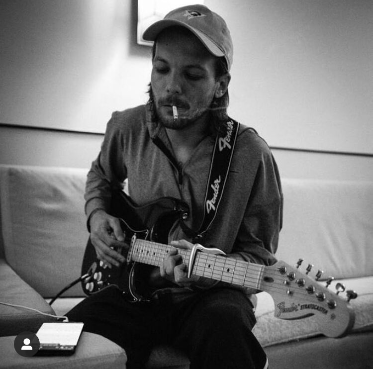 Okay sike! I’m back bcs Louis posted these next two on his insta! He looks so good with the guitar and the cigarette!I vote for  #Louies for  #BestFanArmy at the  #iHeartAwards