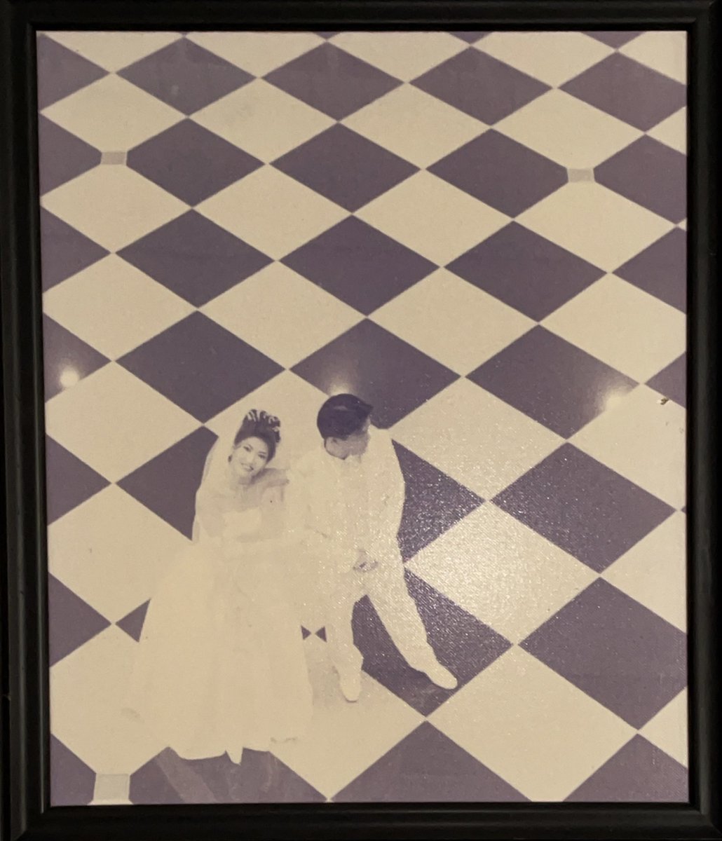 YamKeng's tweet photo. This is our wedding photo hanging on our bedroom wall. 24 years later, we went back to Millenia Walk where we did our photo shoot. The floor tiles are still there, and we are still happily married. 😊

#mybetterhalf #fridaydate https://t.co/4nCYClu1Cb