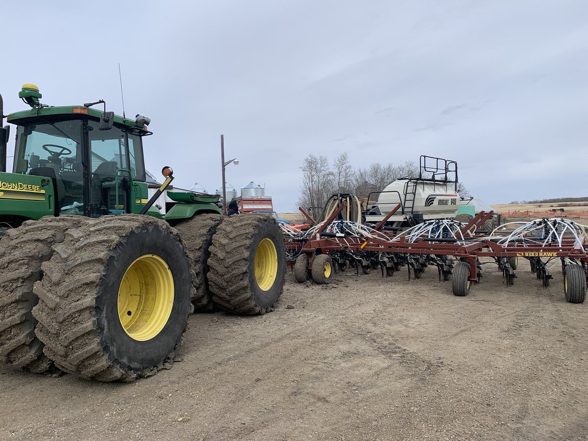 FarmerWilk's tweet photo. Spring is here at the farm! Drill pulled out and changing hoses and wheels and metering augers. @AlpineChad installing  @alpinepfl kit and dosatron injection kit👌🏼. New sprayer delivered from @JHiduk . And sad to see the JD 4650 head to new owner. @SynergyAG @Cowboss7 https://t.co/h7R0FEPBQI