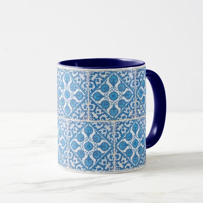 A coffee mug with a #vintage blue and white floral pattern of cornflowers, retouched and reproduced from an actual antique tile at my #Zazzle store: 
ow.ly/iaAM50DSB3r