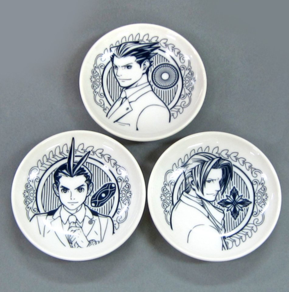 Ceramic plates of Phoenix, Apollo, and Edgeworth from the 2018 orchestra concert. I don't know how up to date this link is or how trustworthy it may be but if it's good and shit's in stock congrats you can buy these for 1500 yen here https://www.suruga-ya.jp/kaitori_detail/992703418