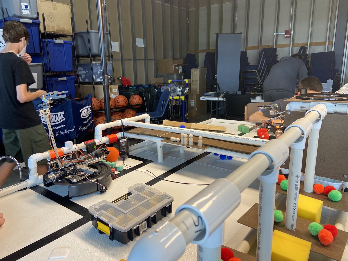 FMCHSRobotics's tweet photo. We’re in a brief intermission from our tourney.  Seeded 6 out of 32 teams for our upcoming DE rounds!  Listening to some motivational Rocky-theme-song music while we make some last-minute tweaks to our bots to hopefully boost our score for DE rounds! 🙏 #botball https://t.co/Z0csmjtDtR