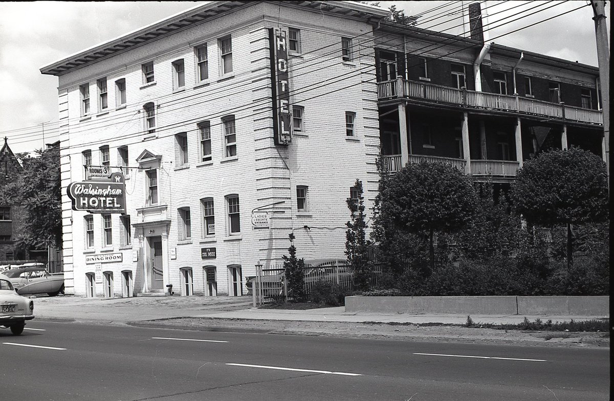 Same site, then and now.Today, a fenced-in Comfort Inn awaiting redevelopment (there is an application for a 46-storey condo on the site).