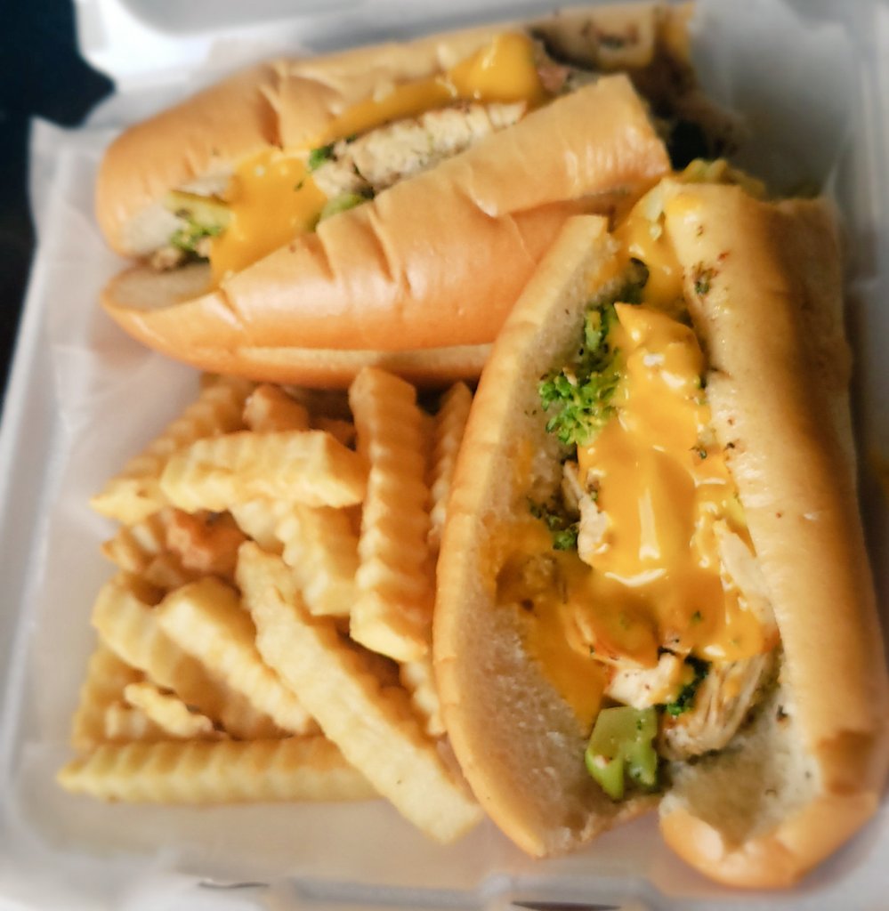 Trying something different. Grilled chicken, broccoli and wiz hoagie from a local pizza shop. I thought it was going to be on a Kaiser roll with American or provolone cheese but I'm not hating this sandwich. 😳