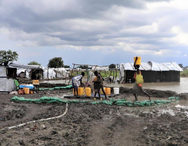 South Sudan More than 1 million people have been affected by severe flooding in South Sudan. Pictured here, people collect water from SMSF's surface water treatment center in Pibor town, where flooding has contaminated water, displaced thousands of people.