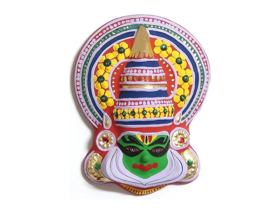 11)Kathakali Papier-mâché MasksKerala known for the spectacular classical dance drama music & ritual Kathakali oldest theatre forms in the world.The masks worn are little relics& showpieces made of paper & glue, including the elaborate headgear, painted face & long black hair.