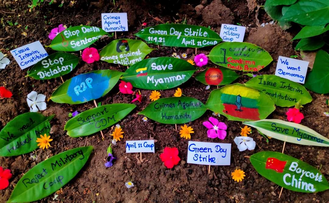 Nan_Ayee's tweet photo. Dictatorship will fall like old leaves and the new leaf representing democracy of Myanmar is on its way. 
We do #GreenDayStrike by writing letters on green leaves rallying against the military dictatorship
#WhatsHappeningInMyanmar
#Apr11Coup https://t.co/PHpDDiqm7z