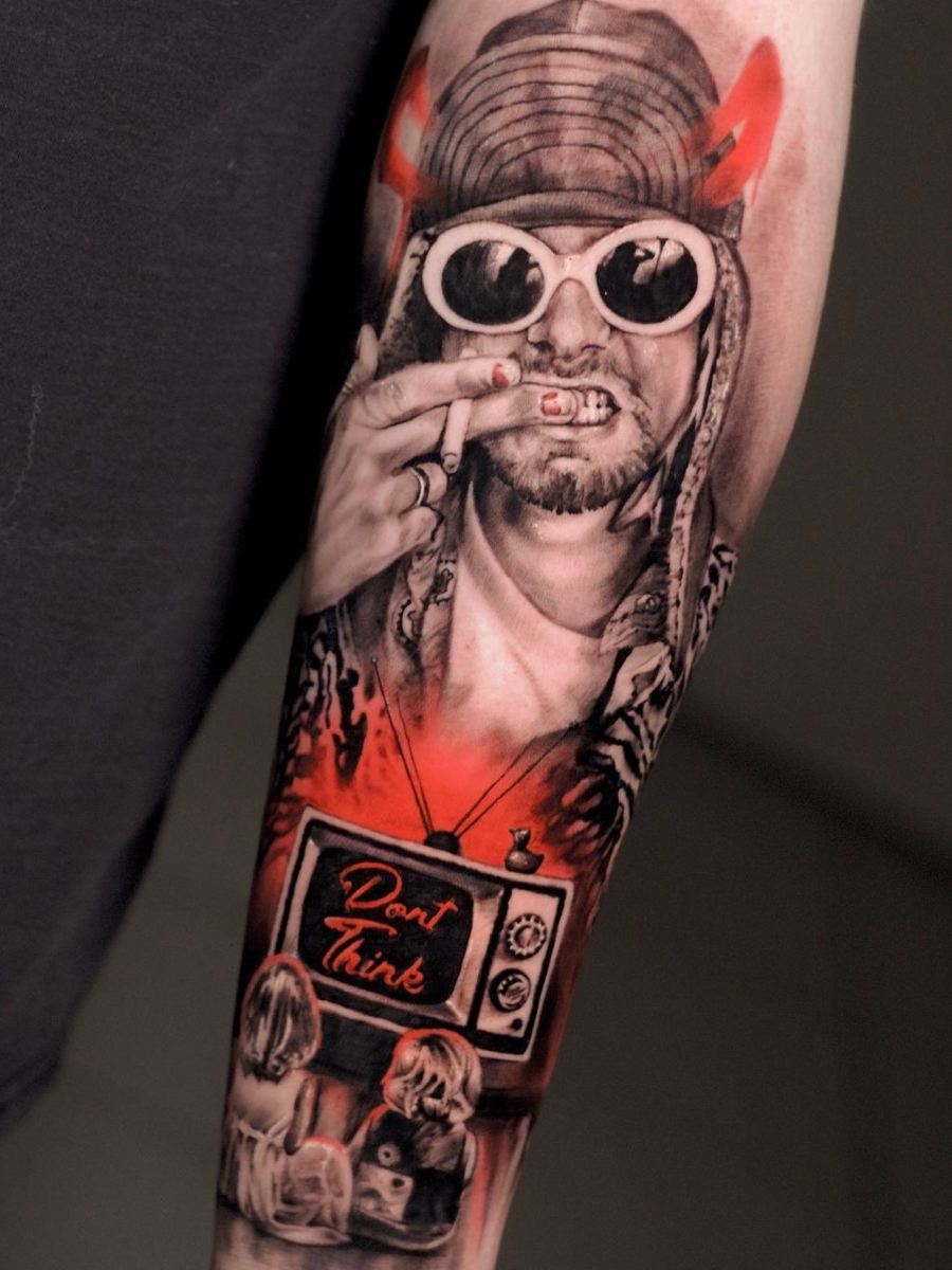 Kurt Cobain with reference tattoo