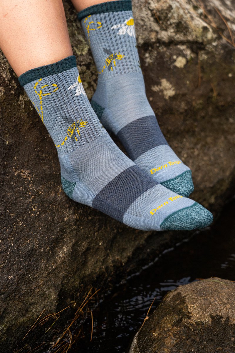 When we go hiking, it's always with a pair of Darn Tough socks! This new style features bees and daisies with a cushioned sole for extra comfort on the trail. #darntough modsock.com/products/women…