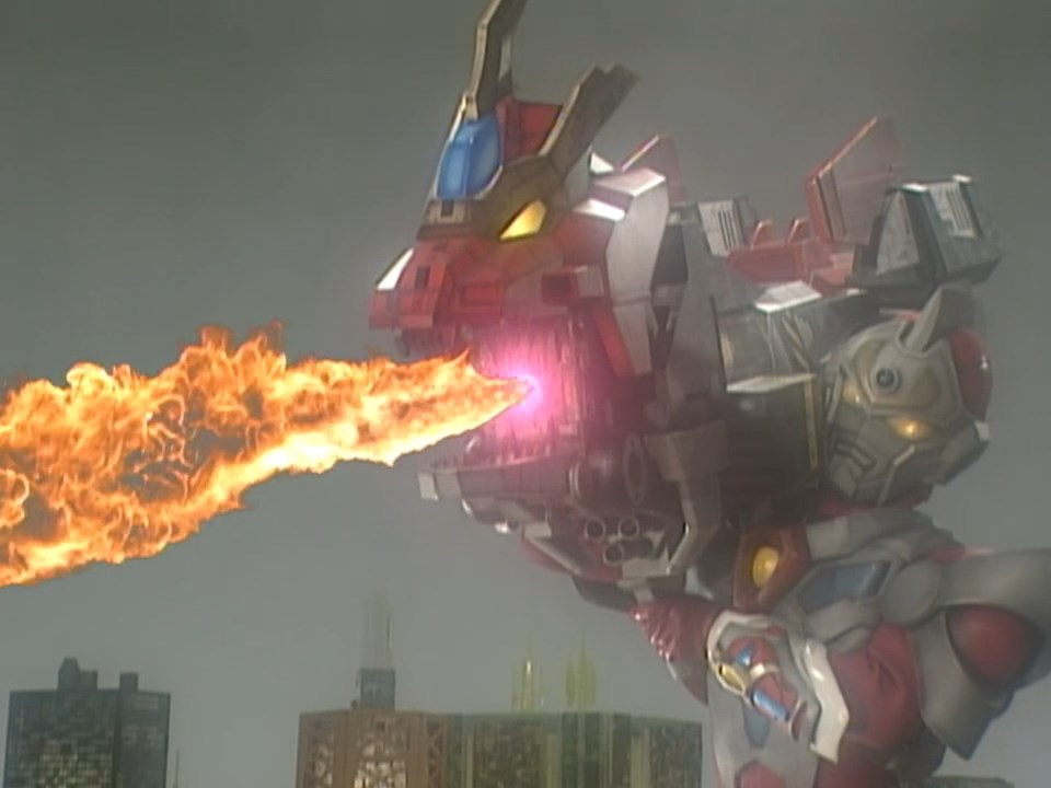 That dragon statue that Gauma holds that "transforms" into Dynazenon is not any random Dragon statue, but an actual object that appeared in Gridman and that was the inspiration for the Dragon Bazooka, one of Gridman's assist weapons.Remember this, it will be important later.