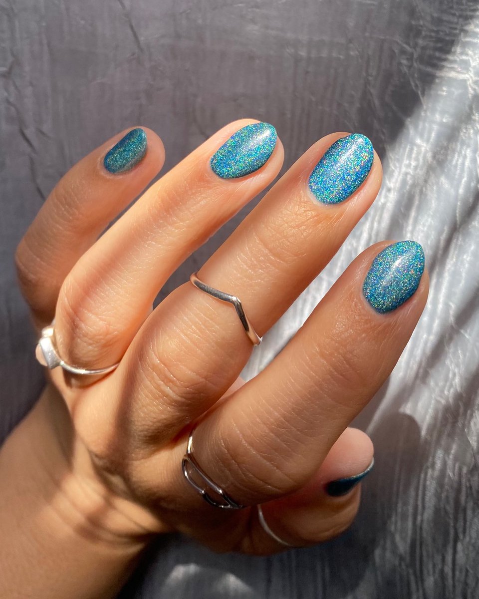 Wearing “Amy” by @LoudLacquer! Look at all that holographic goodness! 😍💙