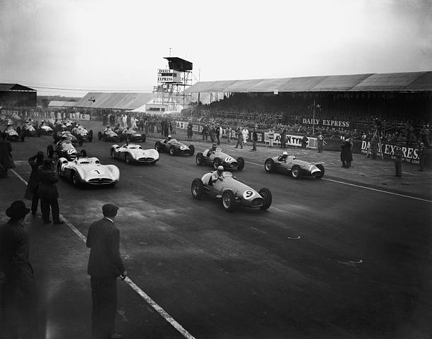Terry Disney knew his way around a car racing track. This is from July 17, 1954: the start of the British Grand Prix at Silverstone. Numbers 1 & 2 are the Mercedes team cars driven by Karl Kling & Juan Fangio. Number 9 won the race: a Ferrari driven by José Froilán González.