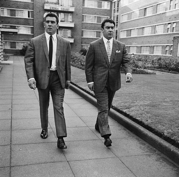 Terry Disney's shot of Ronnie & Reggie Kray in Cedra Court, off Cazenove Road in northeast London, August 1964. Interesting how these two murderous thugs were treated as regular celebrities before their 1968 arrests & subsequent life sentences.