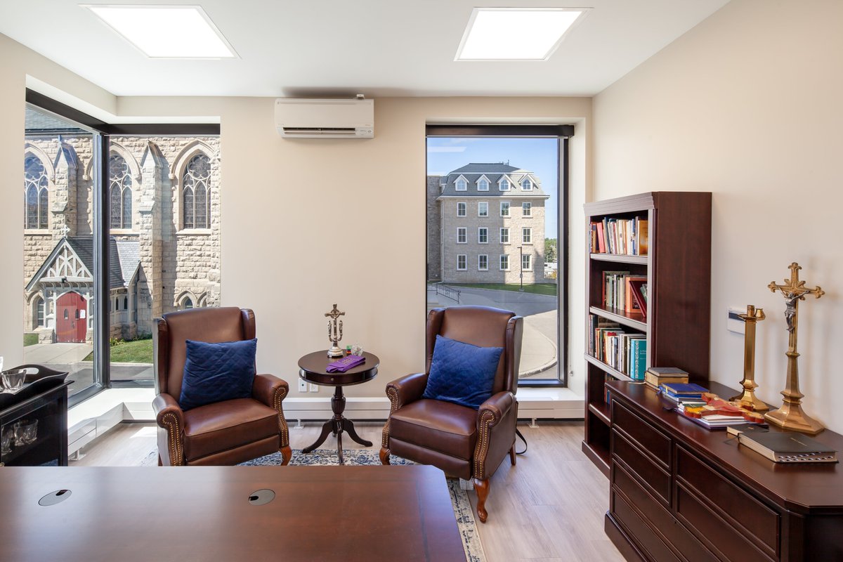 LarkinArch's tweet image. Large windows provide ample natural light and views to the historic Church and Hill, linking the Basilica of Our Lady Immaculate Rectory back to the historic site.