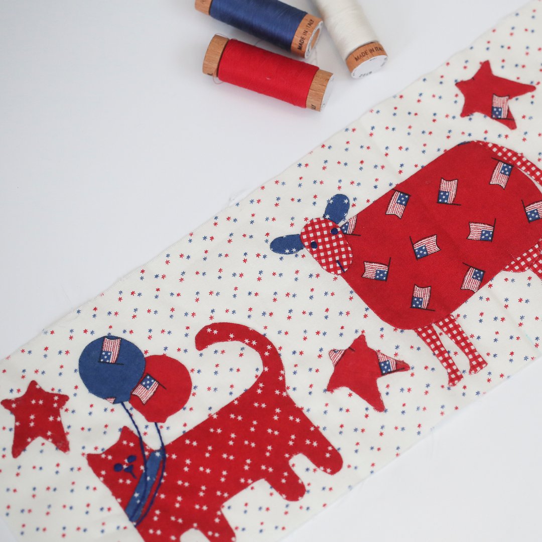 Look who else is joining the parade!  It wouldn’t be a parade without a cow and a barn kitty!  Prairie Days is shipping to quilt shops in September! #prairiedays, #USAquilts, #patrioticquilts, #redwhiteblue, #farmquilts #showmethemoda #modafabrics #applique #appliquequilts #ilo