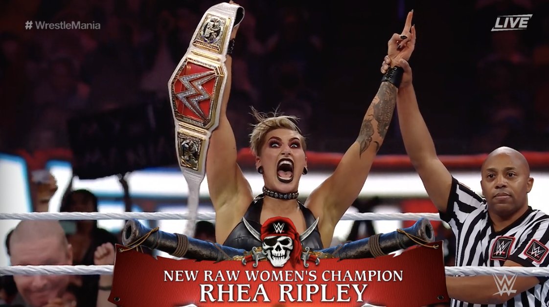 WWEAustralia's tweet photo. WHAT A MOMENT! Congratulations to the NEW #WWERaw #WomenChampion @RheaRipley_WWE! #WrestleMania #WWEAustralia https://t.co/5llk8vfulb