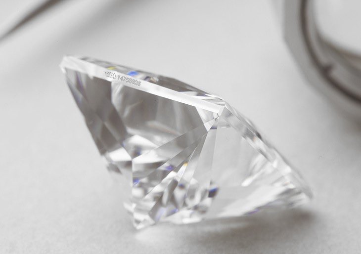 Buy a small jeweler’s loupe (10x-20x mag) and UV LED light so you can inspect the stone up close when it arrives to make sure you got what you ordered. GIA diamonds also have the certificate number micro-laser inscribed on the diamond girdle