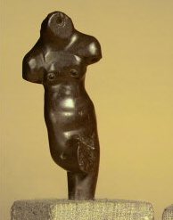 10/n When a similarly sculpted figure of a dancer standing on his right leg, with body bent from the waist up was found, Marshall said “It will be observed, there are socket holes in the neck and shoulders for attachment of head and arms, which were made in separate pieces. “