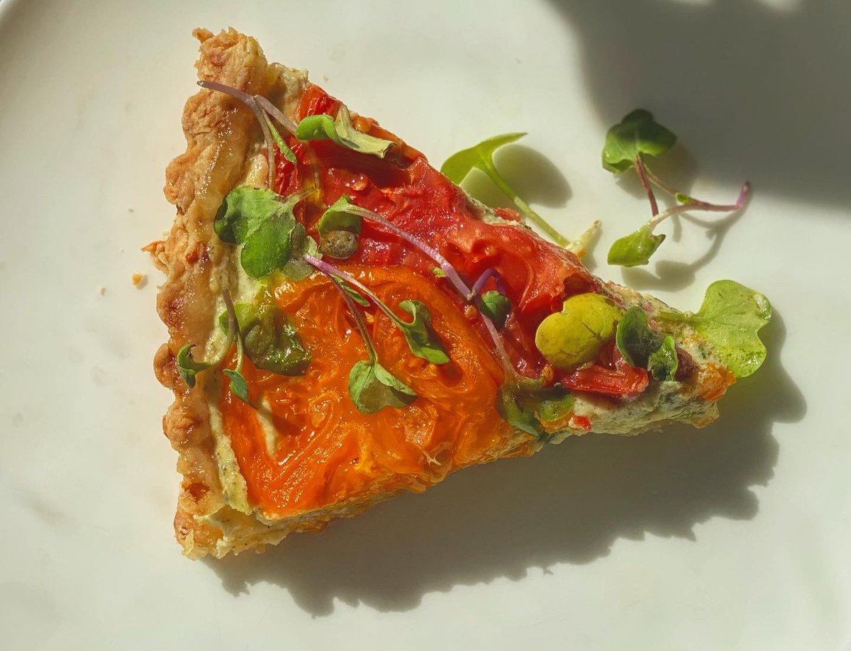 a sweet and smoky heirloom tomato tart, filled with creamy mix of ricotta, goat cheese, herbs, parmesan and garlic. and now, a break from making tarts.