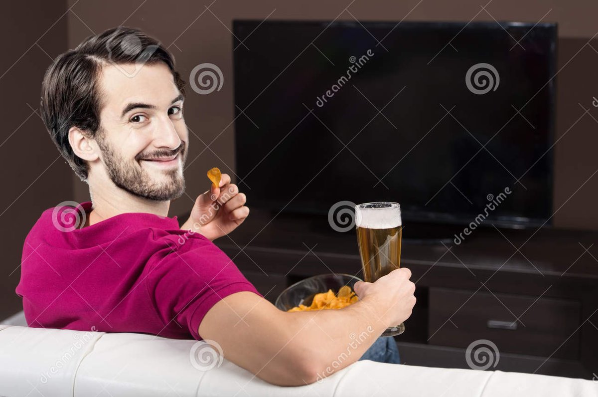 In that case, he can look back toward the reader. We then assume he's still watching the show but has turned momentarily. Advertizers often use this approach to keep their spokesmodels relatable without cutting away from the product.