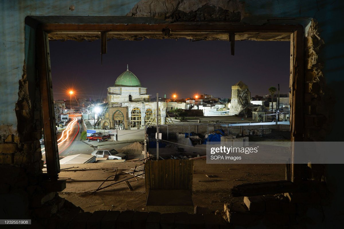 Ismaeladnan99's tweet photo. A view from inside the window of a destroyed house shows the destroyed Al-Nuri Mosque and Al-Hadba Minaret at night.
(Photo by Ismael Adnan/SOPA Images/LightRocket via Getty Images)
#iraq #mosul #mosque #minaret #alhadba #ReviveTheSpiritOfMosul #war #photooftheday #photography https://t.co/cAzDtko3fE
