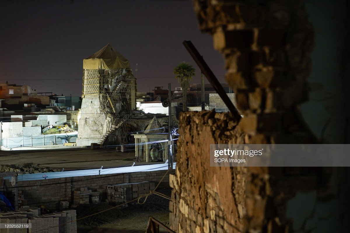 Ismaeladnan99's tweet photo. A view from inside the window of a destroyed house shows the destroyed Al-Nuri Mosque and Al-Hadba Minaret at night.
(Photo by Ismael Adnan/SOPA Images/LightRocket via Getty Images)
#iraq #mosul #mosque #minaret #alhadba #ReviveTheSpiritOfMosul #war #photooftheday #photography https://t.co/cAzDtko3fE