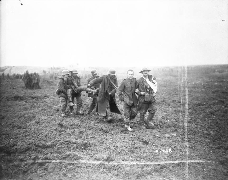 Germans bringing in Canadian wounded over No Man's Land. October, 1917.

amzn.to/3sYRhjj