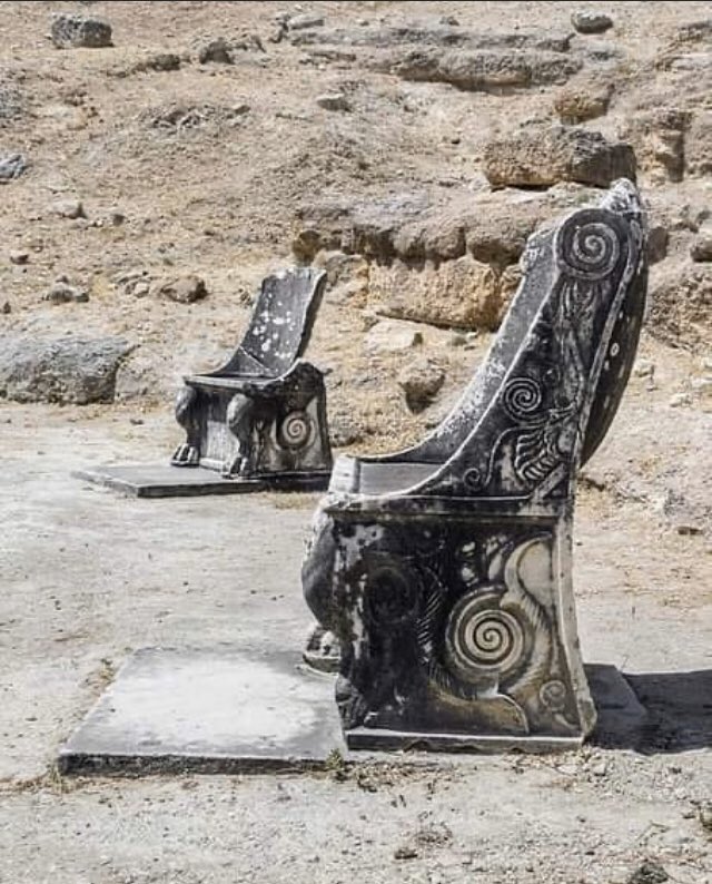 2,000-year-old marble thrones in the Ancient Theater of Oropos, Greece